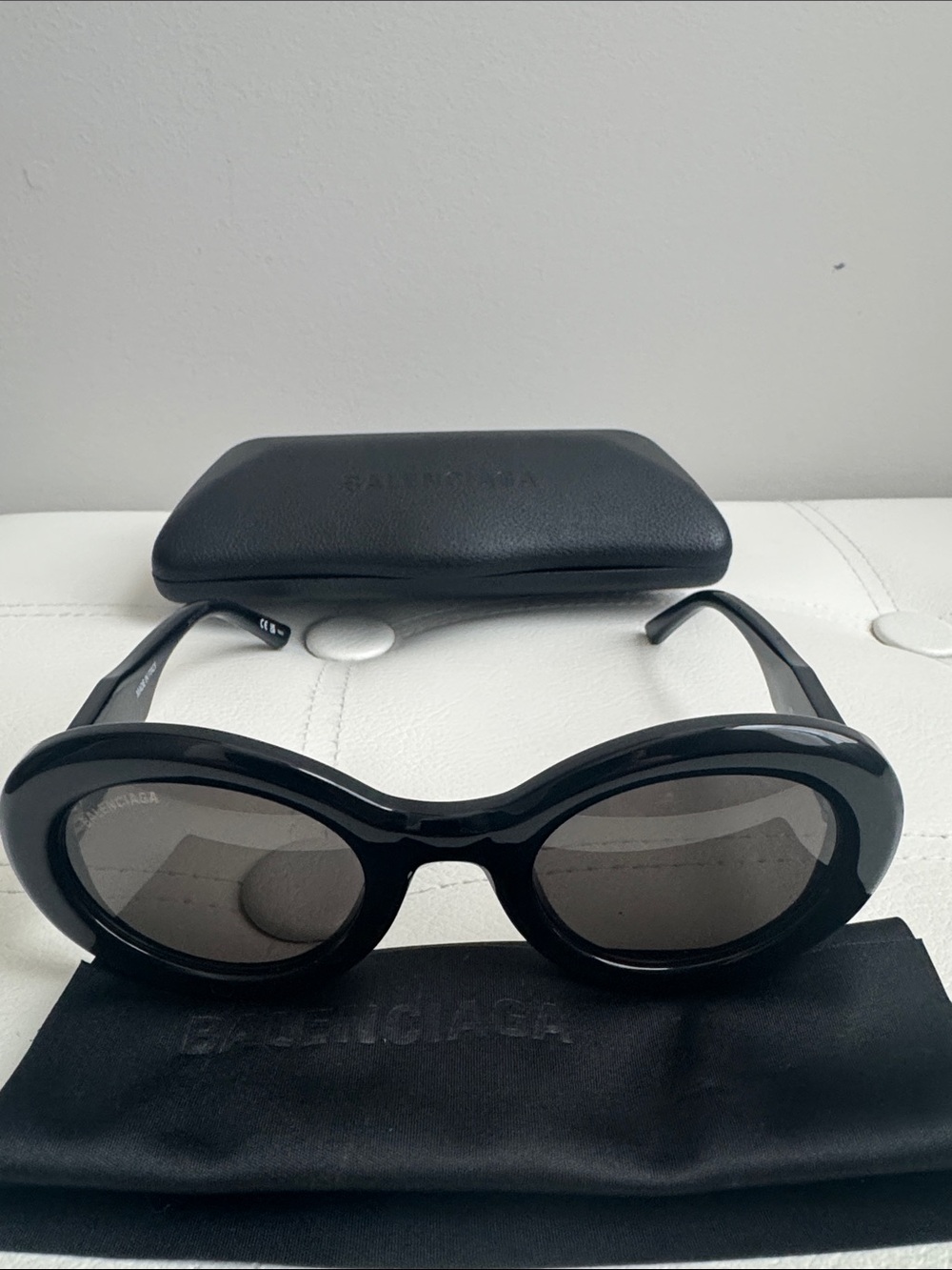 Balenciaga Black Oval Sunglasses with Dark Lenses